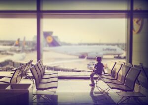 Child waiting in airport