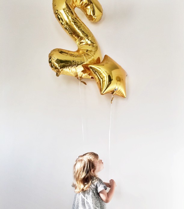 Kid with balloons