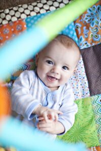 Baby on playmat