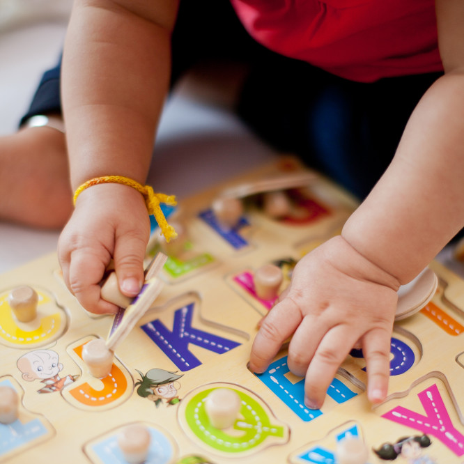 Child with puzzle