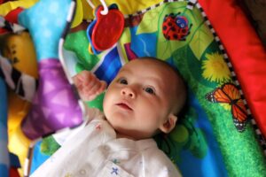 Baby with play mat