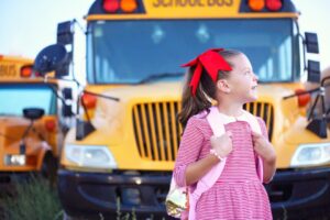 Child boarding a bus