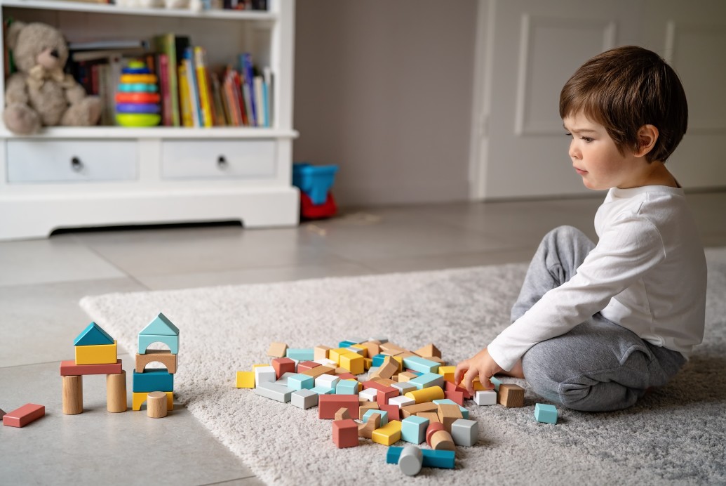 Toddler playing with blocks