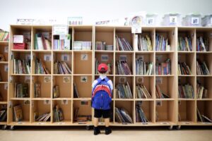 Child choosing library book