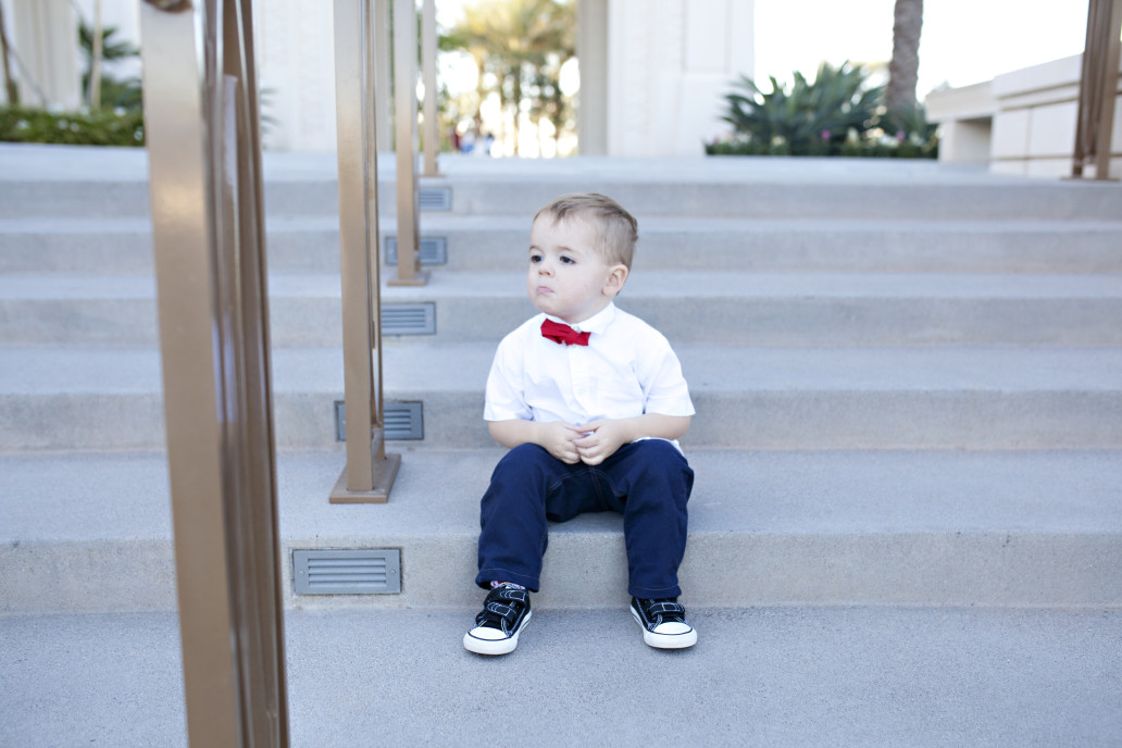 Toddler pouting on steps