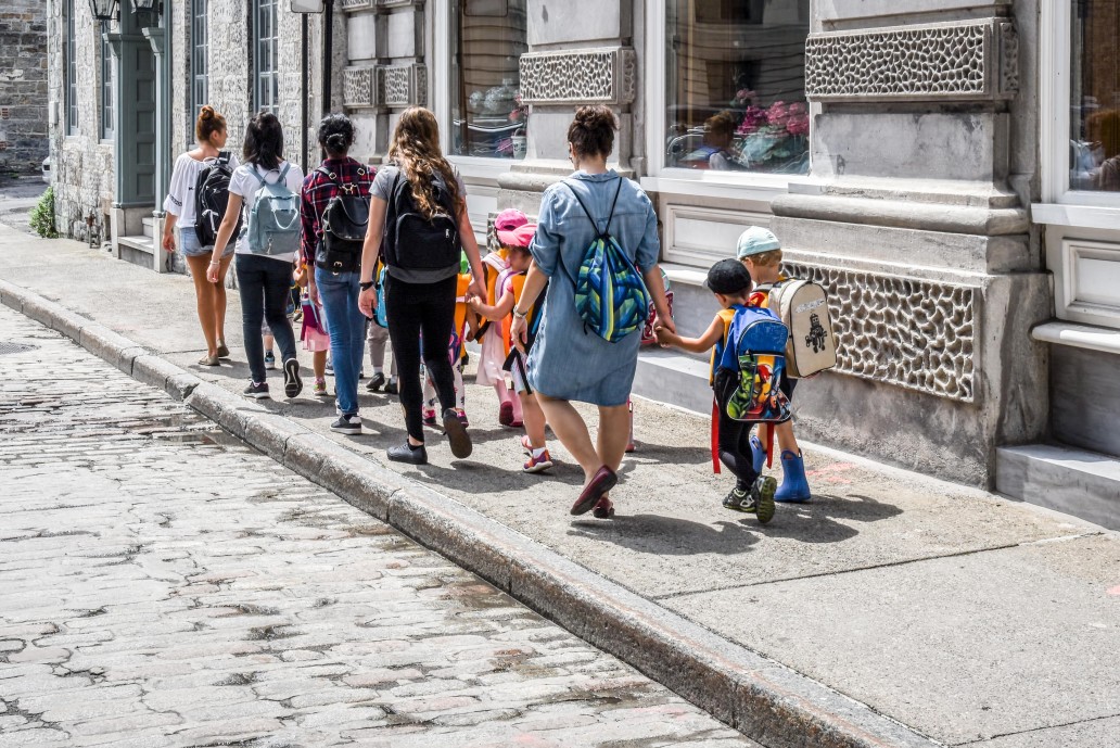 Kids walking to school with parents