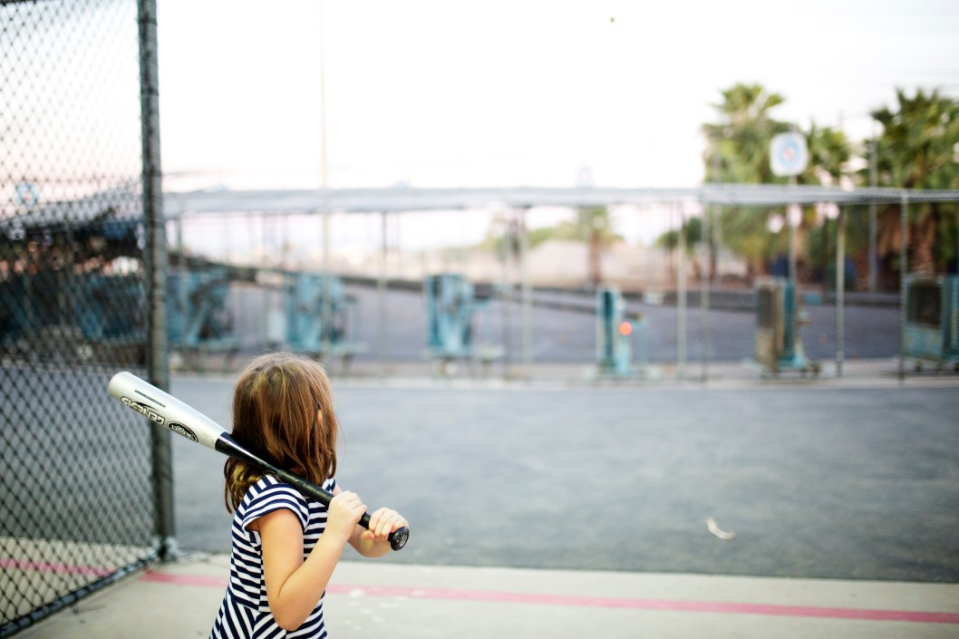 Kid at batting cage