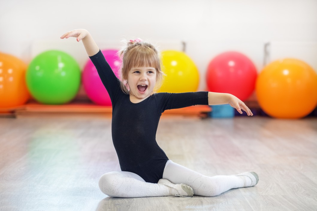 Little girl doing gymnastics