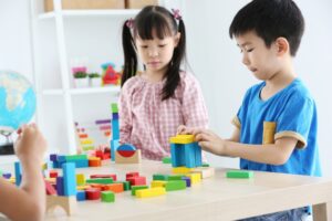 Preschoolers playing with blocks