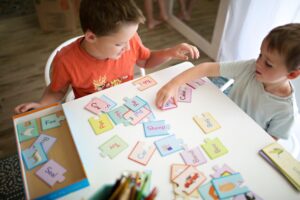 Boy playing a game in preschool.