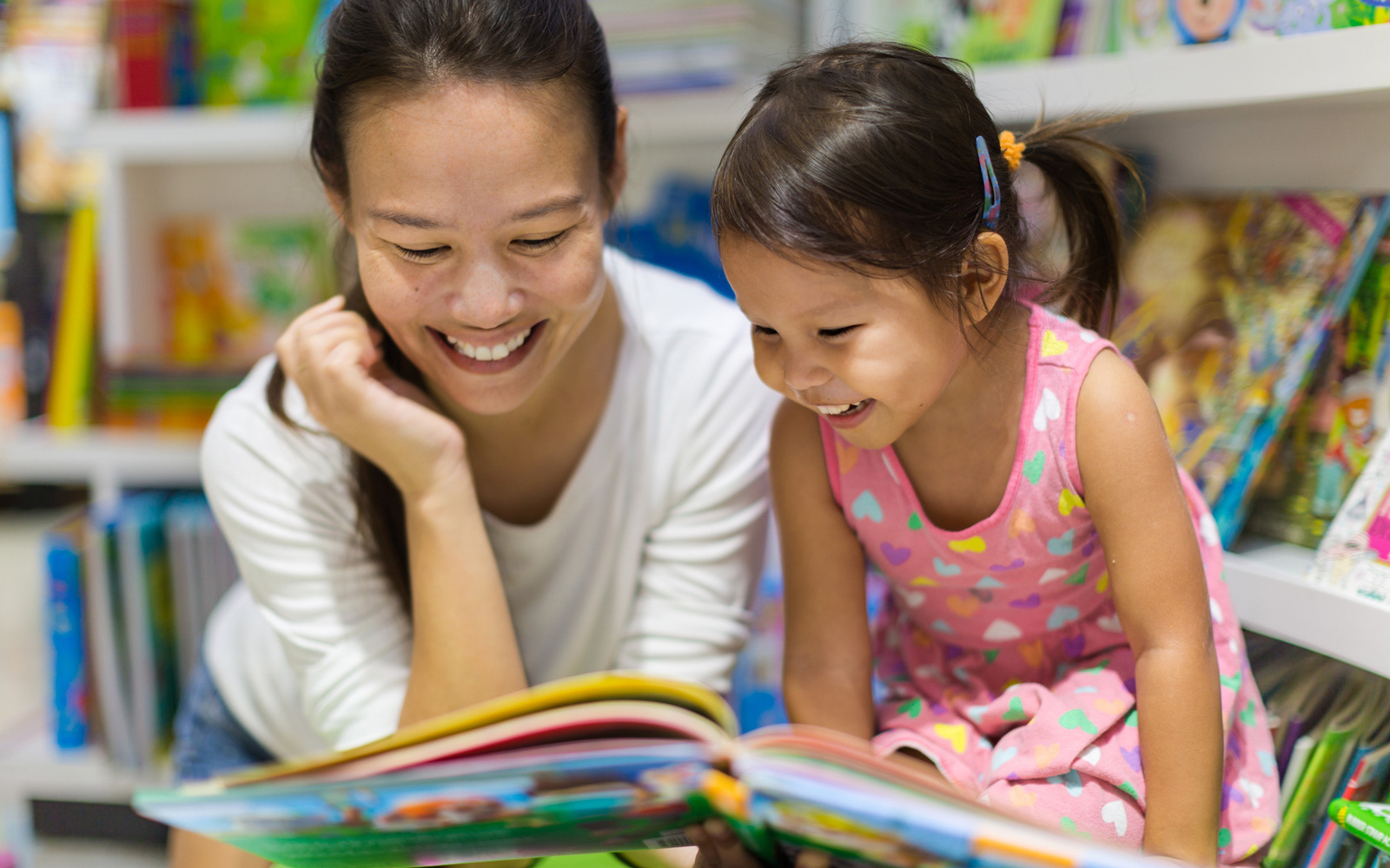 Mom reads with pre-schooler