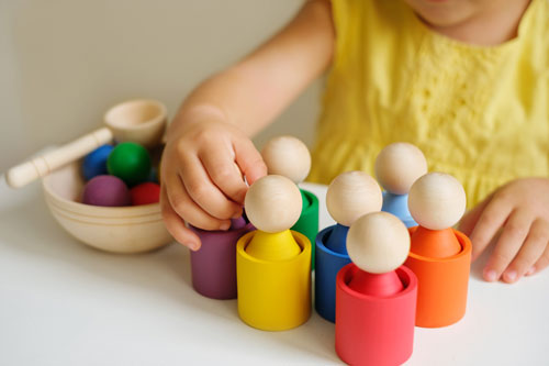 Young Toddler Playing with Blocks