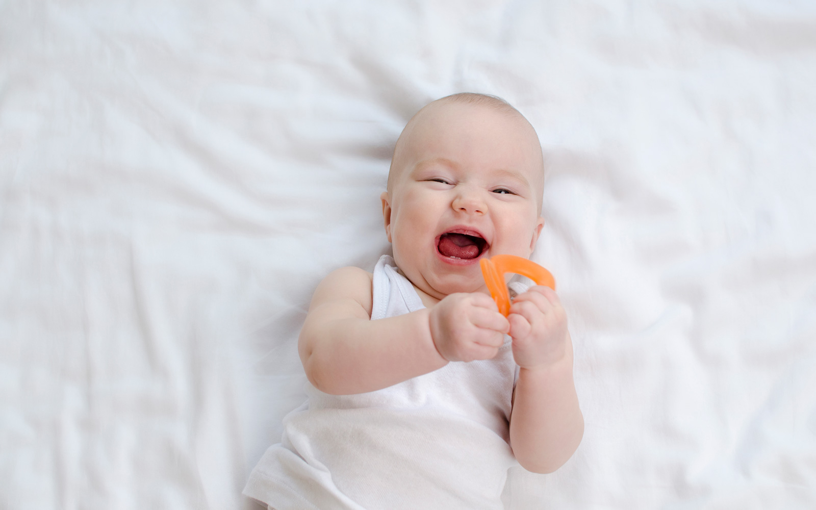 Baby Laughing with Toy