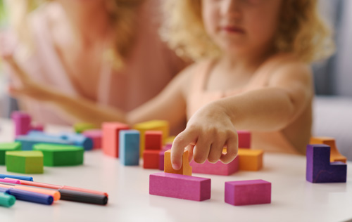 Preschooler Playing with Blocks